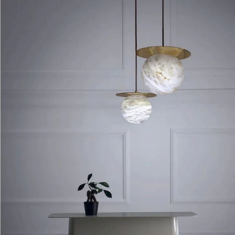 Aria Alabaster Sphere Pendant Light Above Bed