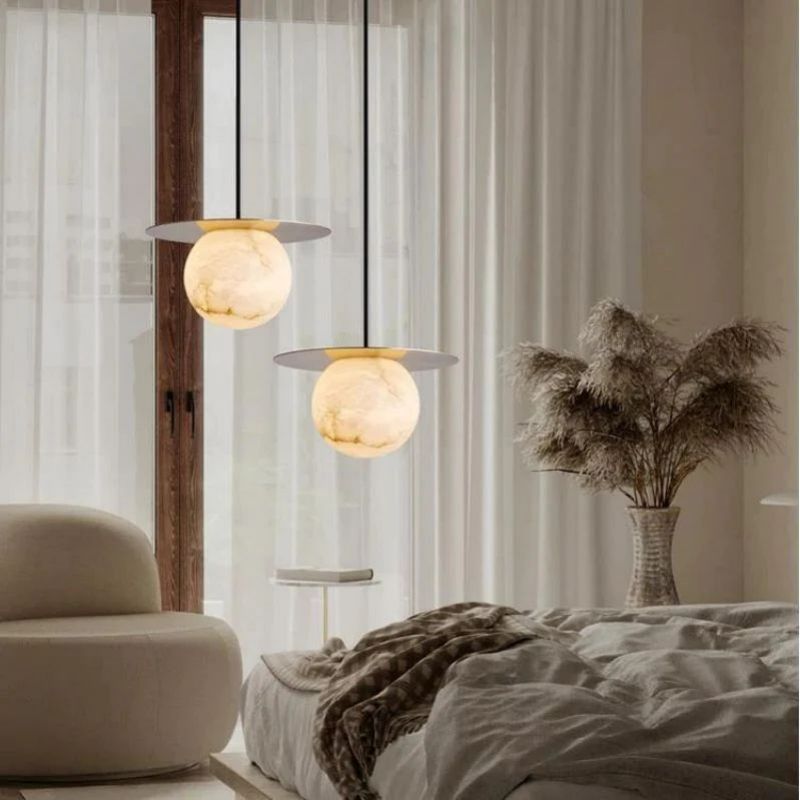 Aria Alabaster Sphere Pendant Light Above Bed