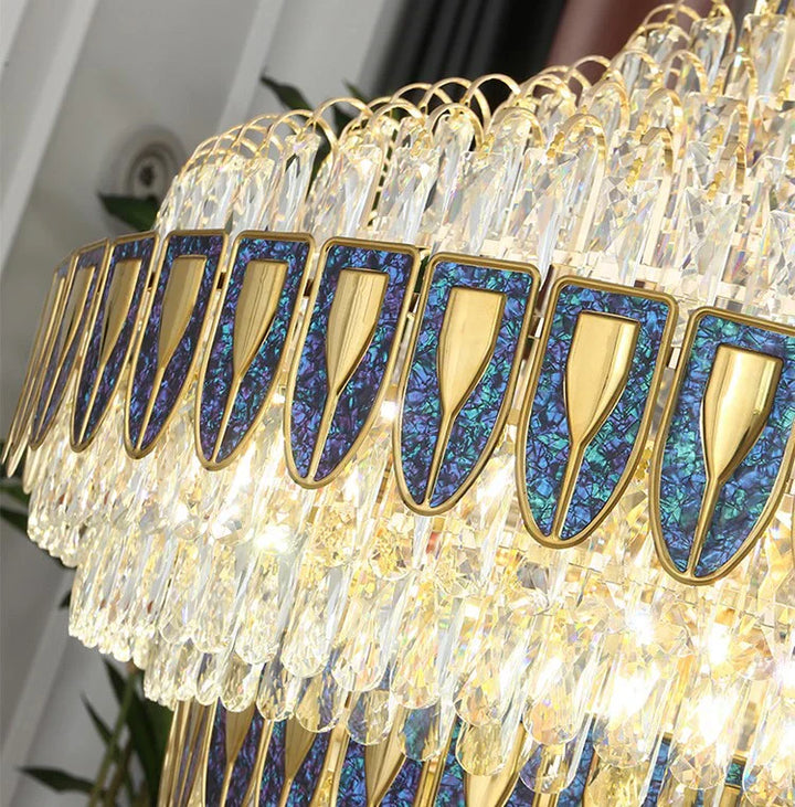 Chandelier crystal pieces reflecting warm light